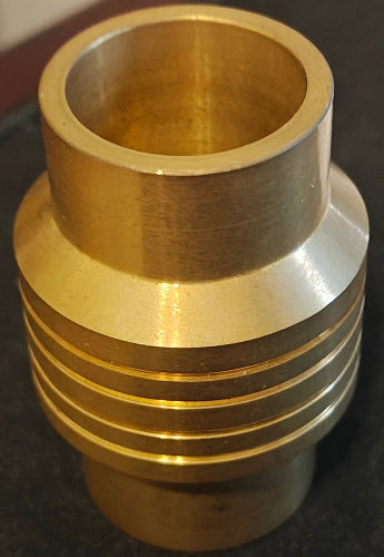 Brass fitting on a wooden surface