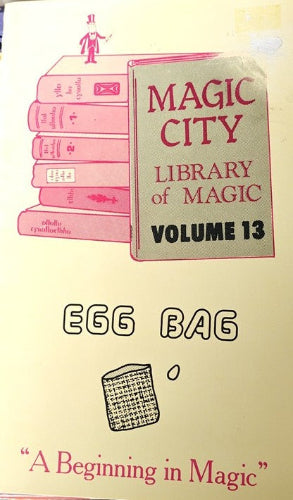 Illustration of 'Magic City Library of Magic' books with an egg bag labeled 'Egg Bag'.