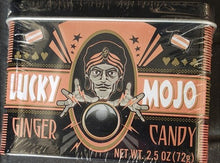 Packaged candy with 'Mojo Candy' branding on a black background