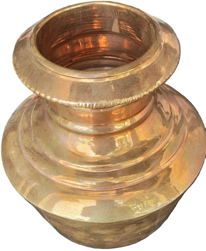 Close-up of a brass fitting against a textured background