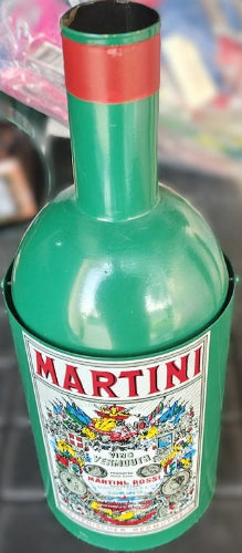 Green bottle with colorful label featuring the Martini brand name.