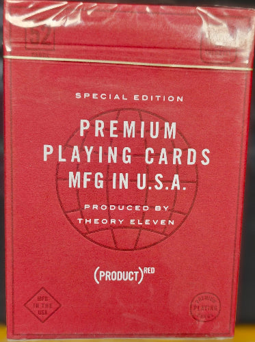 Red playing card box with text on a black background