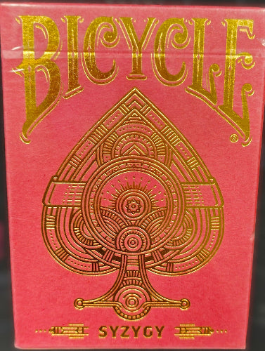 Red deck of cards with gold 'Bicycle' logo on a red background