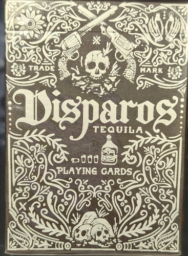 Playing card box with intricate designs and text on a brown background