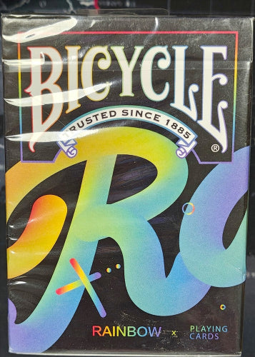 Pack of Bicycle Rainbow playing cards with colorful design and brand name.