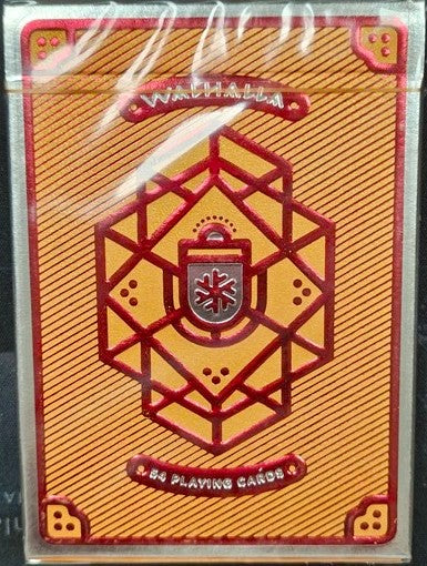 Pack of playing cards with red and gold design and visible brand name.