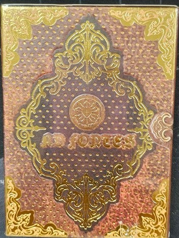 Decorative book cover with gold embossed design and text