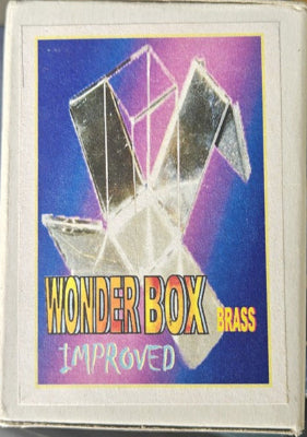 Cassette tape with 'Wonder Box Improved' and 'Brass' text on a blue and purple gradient background.