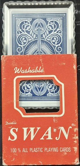 Red packaging of Swan playing cards with blue card design on a black background