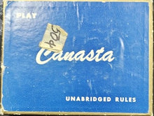 Canasta game rules book with blue cover and white text