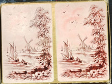 Notebook with artistic cover design on a desk next to a keyboard