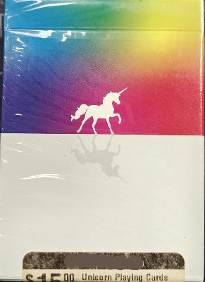 Unicorn-themed playing cards with a colorful gradient background and Iowa Magic Shop branding.