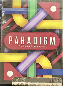 Pack of Paradigm playing cards with colorful geometric design on the packaging.