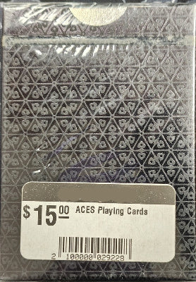 Packaged playing cards with a geometric pattern and 'Iowa Magic Shop' label.