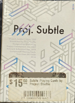 Playing card box with geometric design and text on a beige background