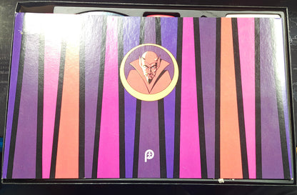 Colorful striped box with a logo on a desk