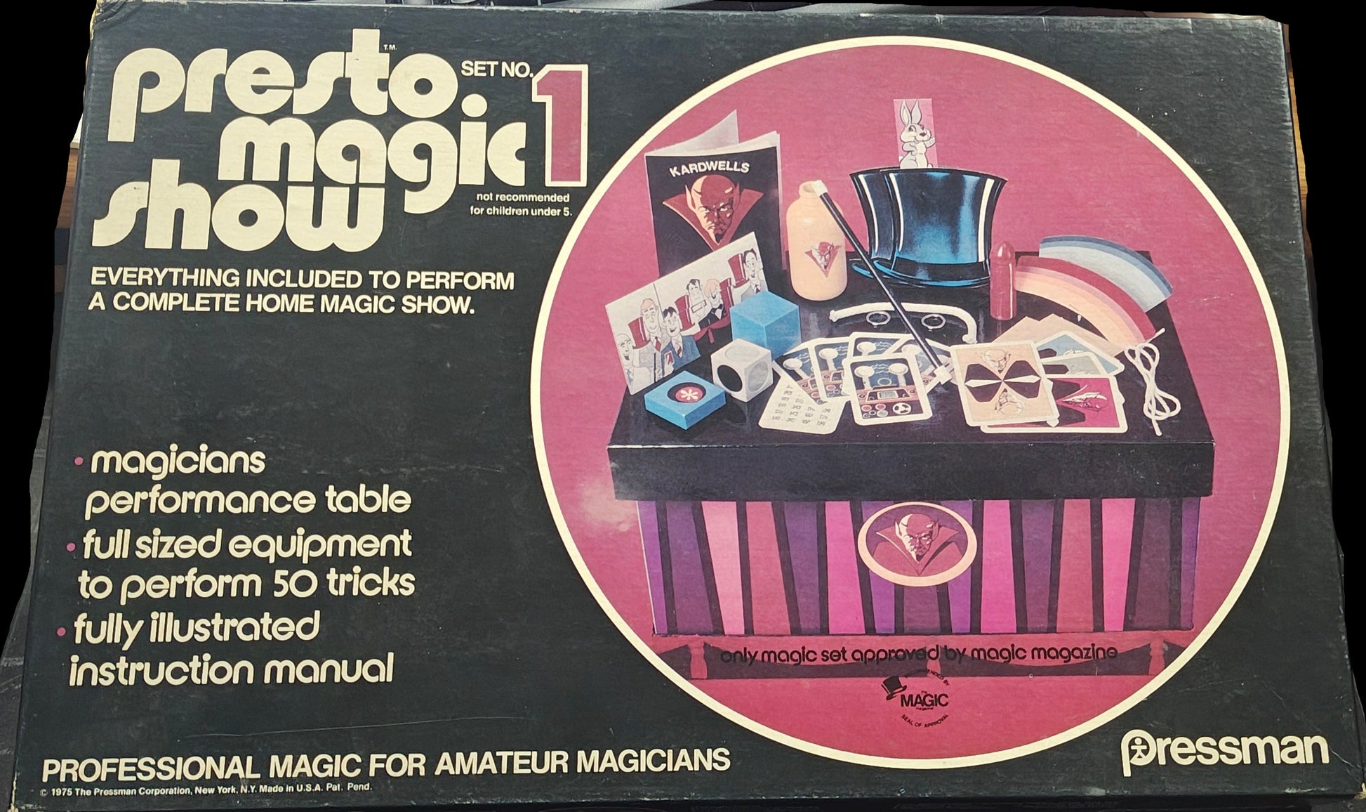 Box for Presto Magic Show on a desk with office items