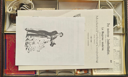 Vintage book with black and white illustration on a wooden surface