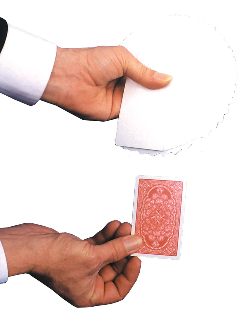 Hand holding a red playing card with a white background