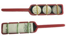 Red coin holder with three silver coins and a roll of money on a white background