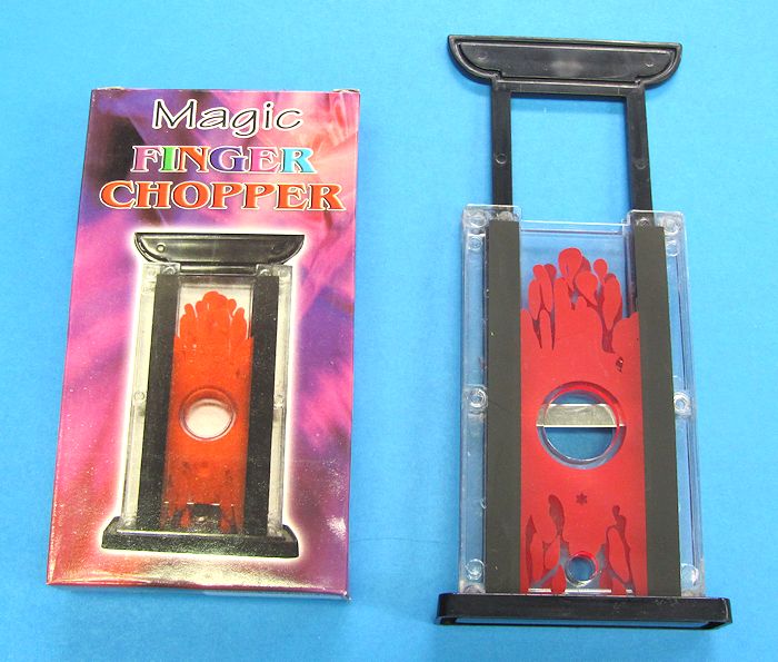 Magic Finger Chopper with packaging on a blue background