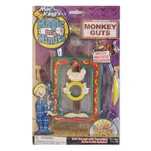 Toy packaging with a cartoon monkey and a person, featuring colorful graphics and text.