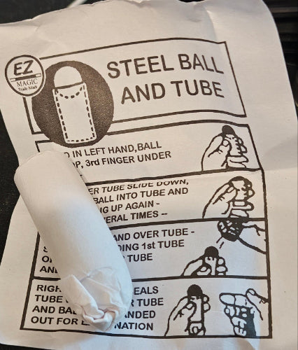 Close-up of a medical device packaging with instructions on a dark background