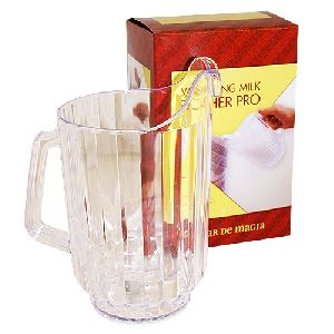 Clear pitcher with a box labeled 'Milk Frother Pro' on a white background