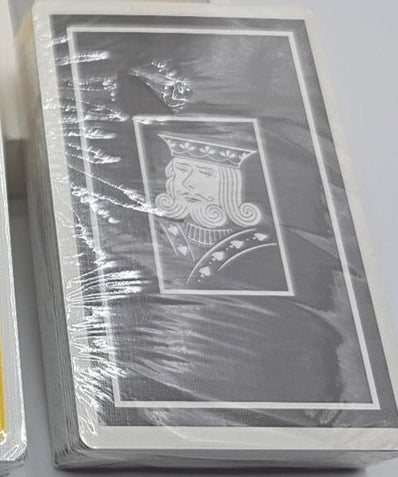 Pack of playing cards with a visible brand logo on a white background