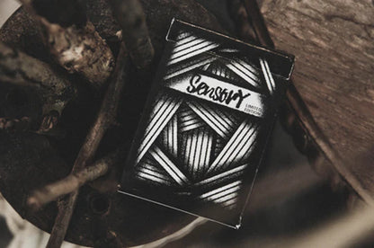 Black and white patterned product with 'Sensory' branding on a wooden surface
