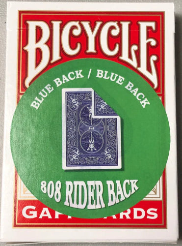Bicycle playing card deck with blue back and green circle on a gray background