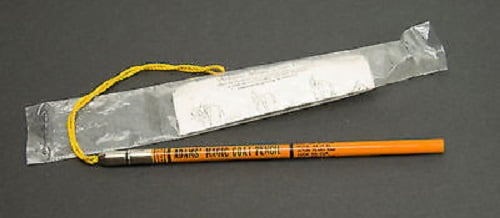 Orange pen with a clear plastic sleeve on a gray background