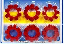 Set of red flower-shaped objects on a yellow background