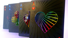 Black playing cards with colorful heart design on a white background