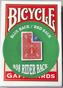 Bicycle card game packaging with red and green design on a gray background