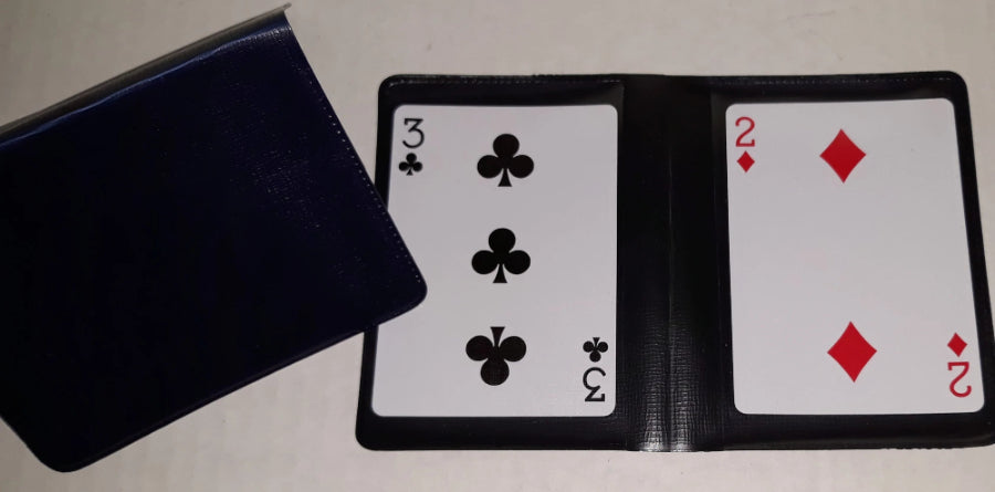 Playing cards with a black case on a white background