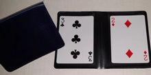 Playing cards with a black case on a white background