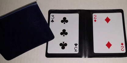 Playing cards with a black case on a white background