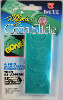 Empire Magic Coin Slide packaging with green slide and colorful text on a beige background