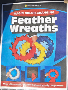 Trickmaster Magic Color-Changing Feather Wreaths packaging with images of color-changing wreaths.