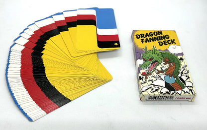 Colorful deck of cards fanned out next to its packaging featuring a dragon illustration on a white background.