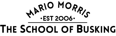 Logo of Mario Morris The School of Busking with a black and white design.
