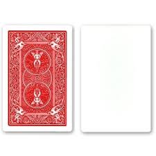 Red and white playing cards with a central design