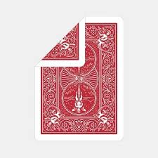 Red playing card with a white border on a light gray background