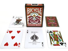 Bicycle playing cards with a dragon back design, including cards and box on a white background.