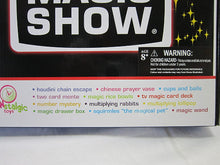 Box of a magic show toy set with various magic tricks listed, featuring the brand 'Nostalgic Toys'.