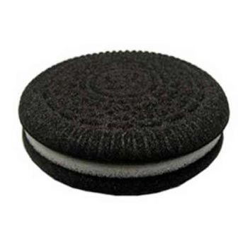 Black circular object with a white center on a white background