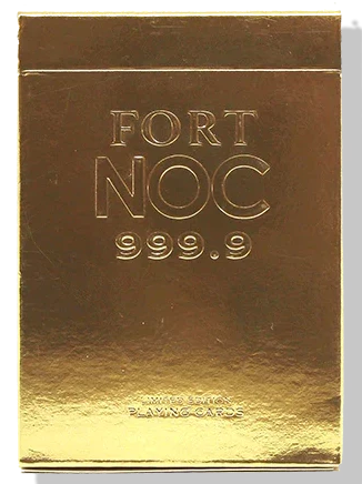 Gold foil card holder with 'FORT NOC 999.9' embossed text on a white background