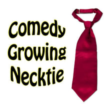 Red necktie with text 'Comedy Growing Necktie' on a white background