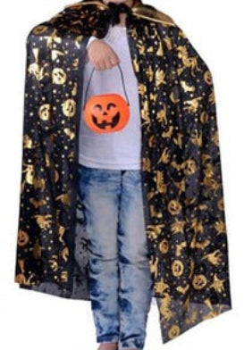 Child wearing a Halloween-themed cloak and hat on a white background